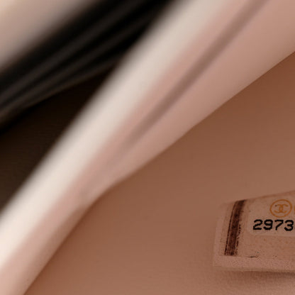 Chanel Lambskin Quilted Wave Clutch White